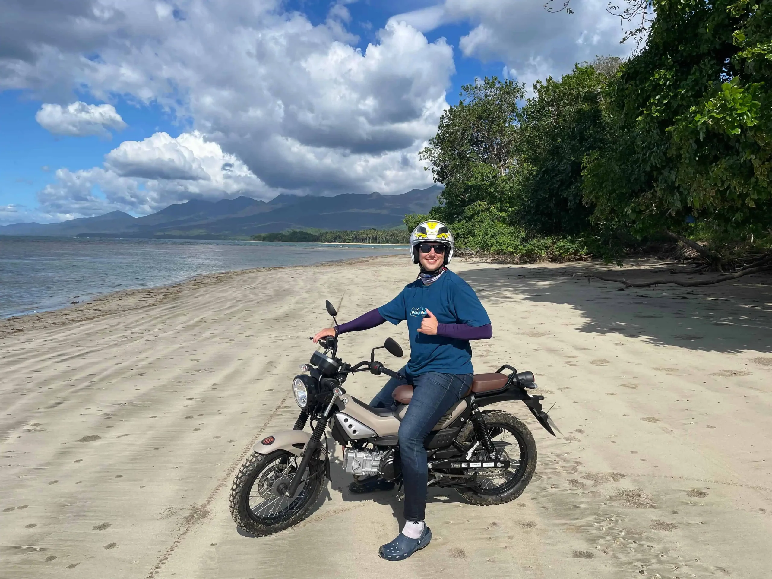Rider on the Curated Motorcycle Tour in Puerto Princesa, starting from Café Moto Hostel and featured in popular Puerto Princesa tours.
